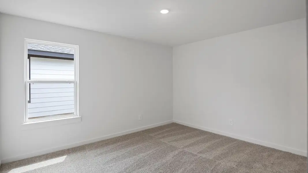 Spacious, unfurnished interior of a new home in Tamarron, Fulshear (Image 24).