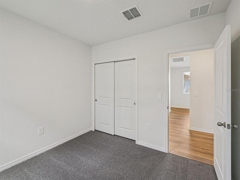 Spacious, unfurnished interior of a new home in Coasterra - Premier Series, Palmetto (Image 16).