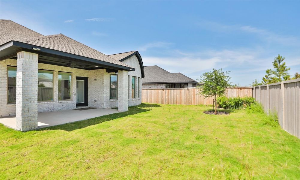 Exterior details and patio area of a home in , Cypress (Image 3).