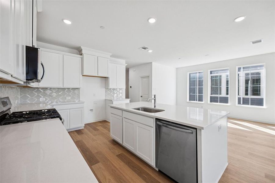 The chef in the family will never be left out of the party in this fabulous home!