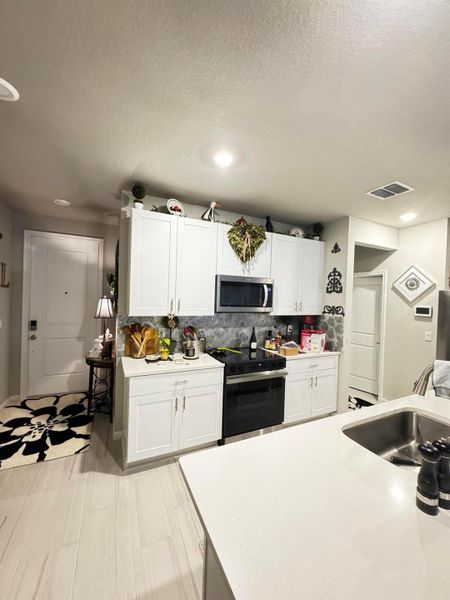 Furnished interior view inside a new home in , Stuart (Image 6).