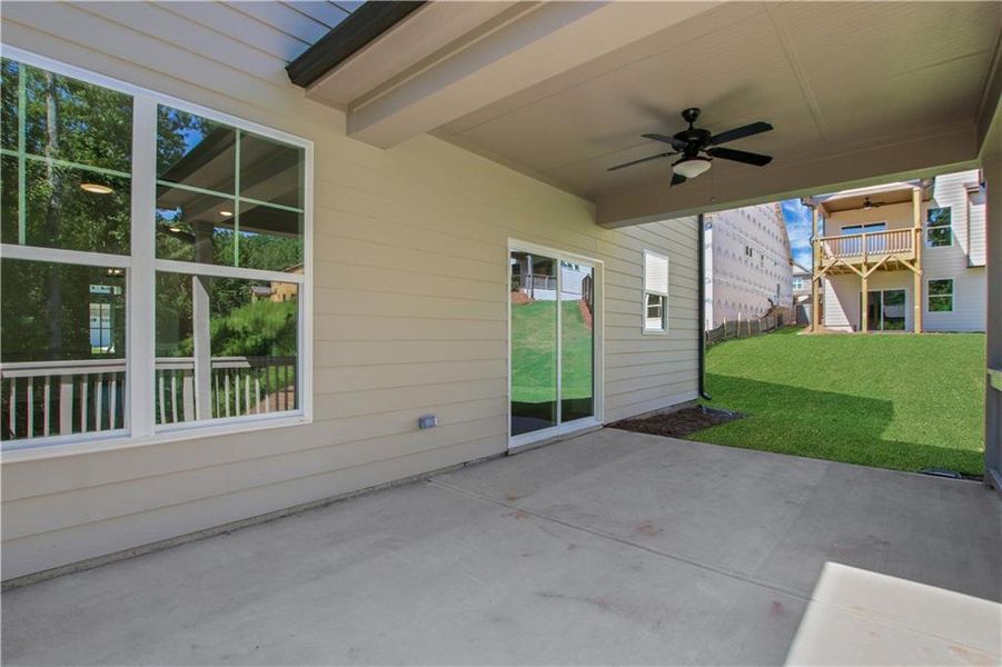 Exterior details and patio area of a home in Marble Tree, Ball Ground (Image 3).
