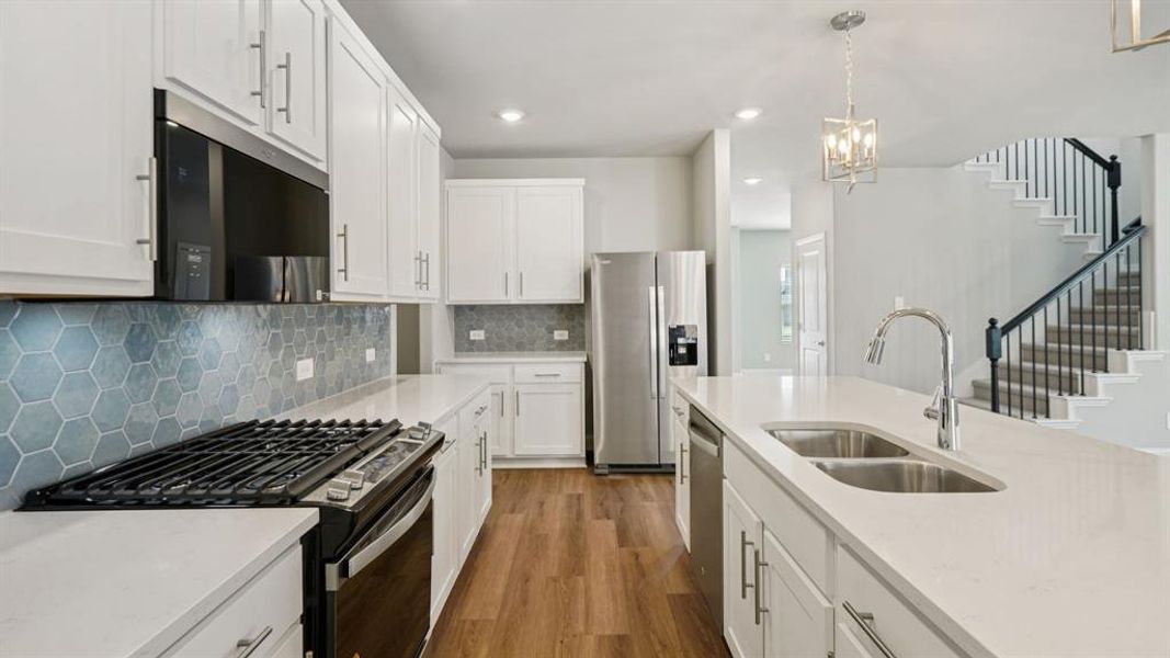 Photo is not of the actual home, but is an inspirational photo of builder’s model home and may depict options, furnishings, and/or decorator features that are not included.