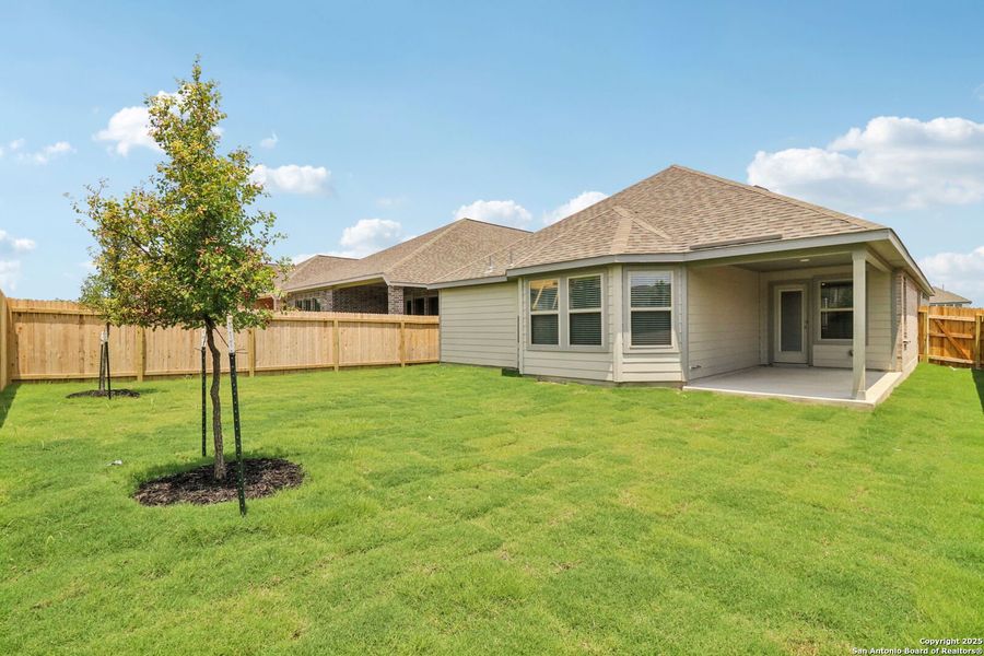 Front exterior of a new home in Kallison Ranch, San Antonio, TX, highlighting curb appeal (Image 25). Front exterior of a new home in Kallison Ranch, San Antonio, TX, highlighting curb appeal (Image 25).
