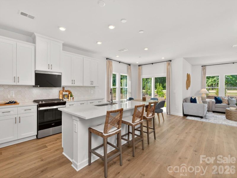 Photo is not of the actual home, but is an inspirational photo of builder’s model home and may depict options, furnishings, and/or decorator features that are not included