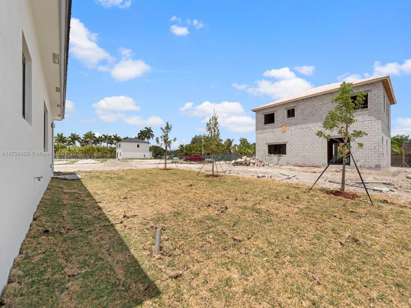 Front exterior of a new home in , Homestead, FL, highlighting curb appeal (Image 17).