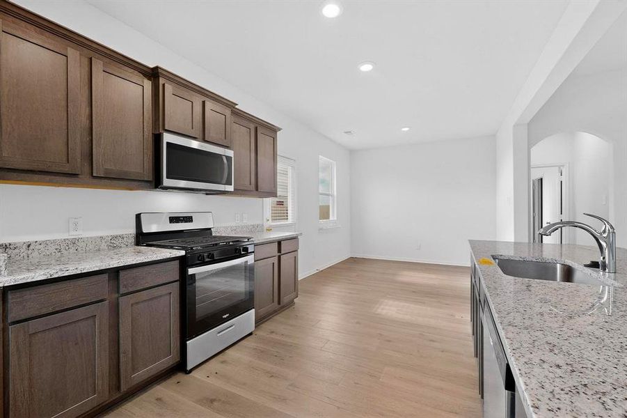Furnished interior view inside a new home in Patriot Estates, Venus (Image 12).