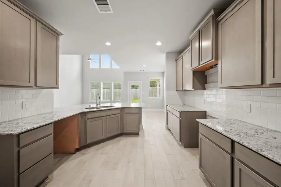 Furnished interior view inside a new home in Grand Oaks – The Cove, Houston (Image 9).