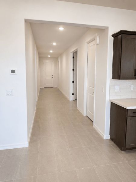Spacious, unfurnished interior of a new home in The Grove at El Cidro, Goodyear (Image 11).