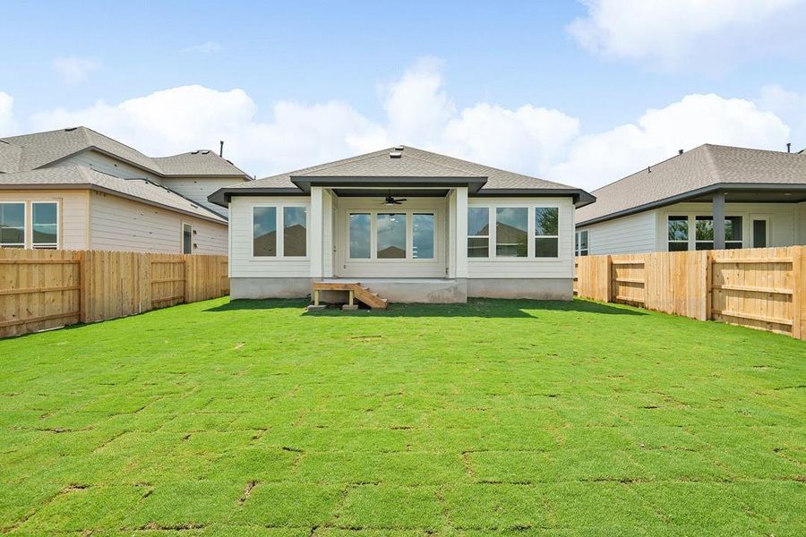 Front exterior of a new home in Park Collection At Park Central, Georgetown, TX, highlighting curb appeal (Image 19). Front exterior of a new home in Park Collection At Park Central, Georgetown, TX, highlighting curb appeal (Image 19).