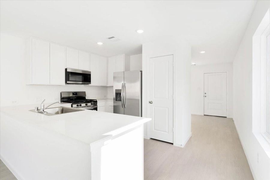 Furnished interior view inside a new home in Synova: Cottage Collection, Crosby (Image 6). Furnished interior view inside a new home in Synova: Cottage Collection, Crosby (Image 6).