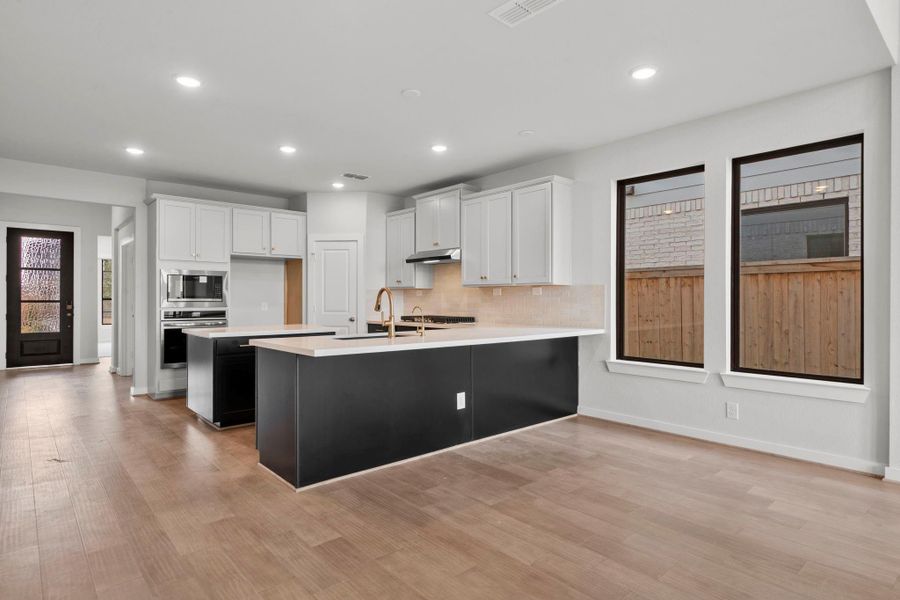 Furnished interior view inside a new home in Bridgeland 45', 50', 70', Cypress (Image 9).