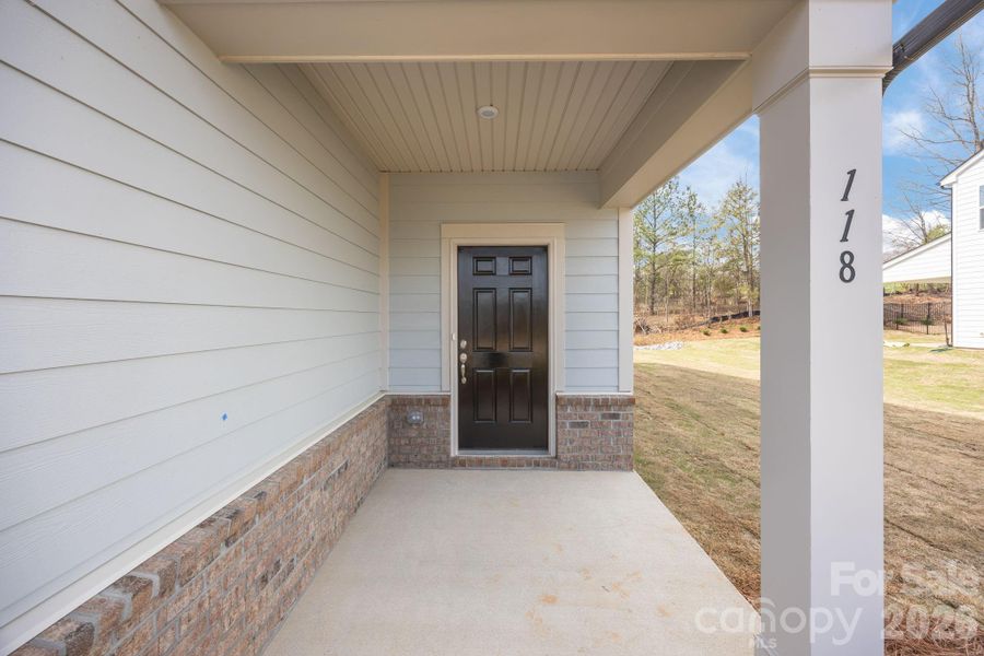 Exterior details and patio area of a home in Farms at Bellingham, Mooresville (Image 4).