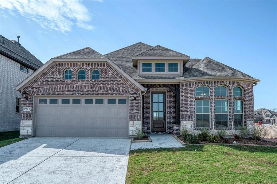 Front exterior of a new home in Meadow Vista, Anna, TX, highlighting curb appeal (Image 19).
