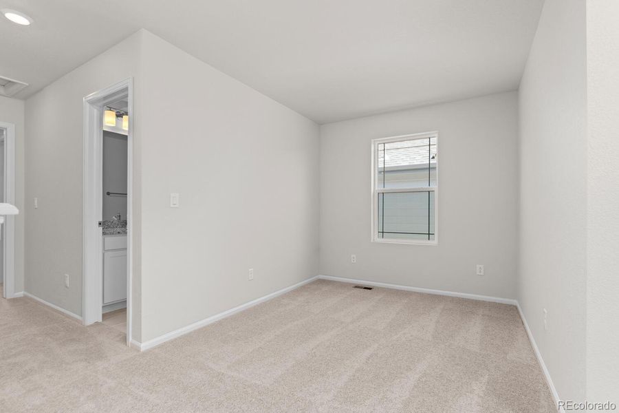 Spacious, unfurnished interior of a new home in The Villas Collection at Sterling Ranch, Littleton (Image 13).