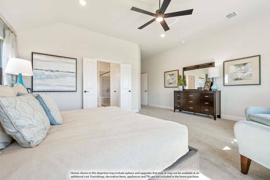 Spacious master bedroom with vaulted ceiling, ceiling fan, dark wood dresser, and carpet flooring Spacious master bedroom with vaulted ceiling, ceiling fan, dark wood dresser, and carpet flooring