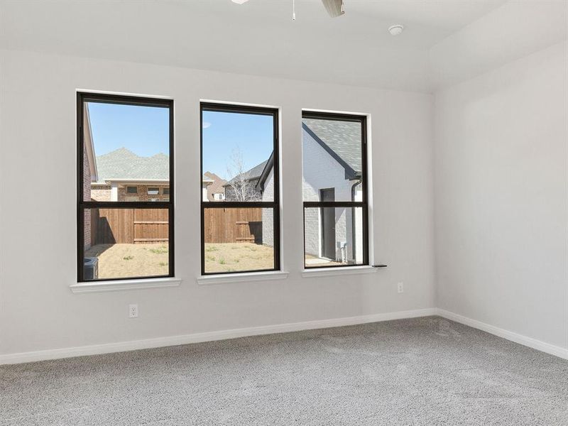 Your dreamy owner's suite is located at the rear of the home for additional privacy.