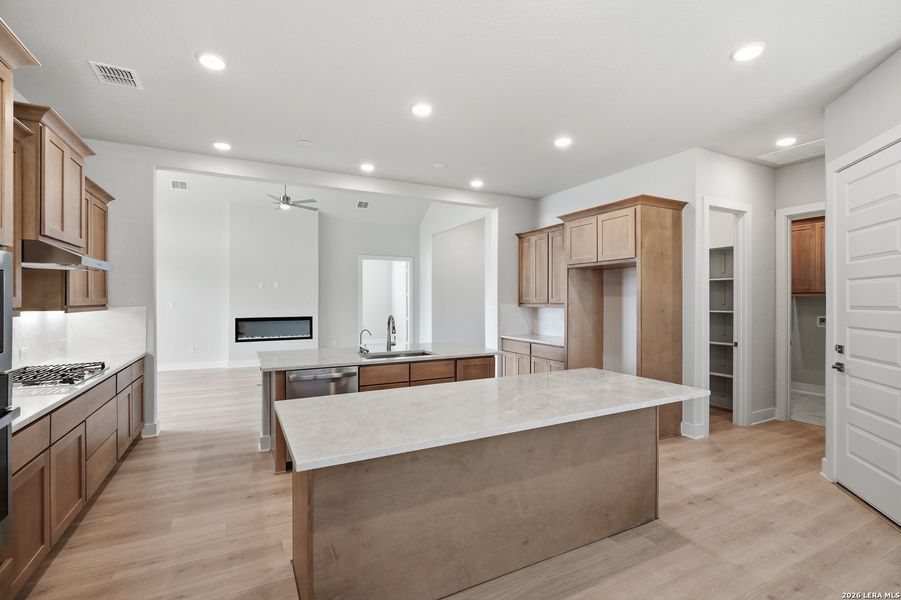 Furnished interior view inside a new home in Potranco Oaks, Castroville (Image 8).