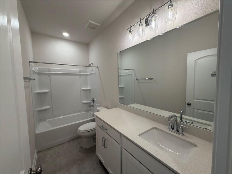 Furnished interior view inside a new home in Willow Springs, Buda (Image 6).