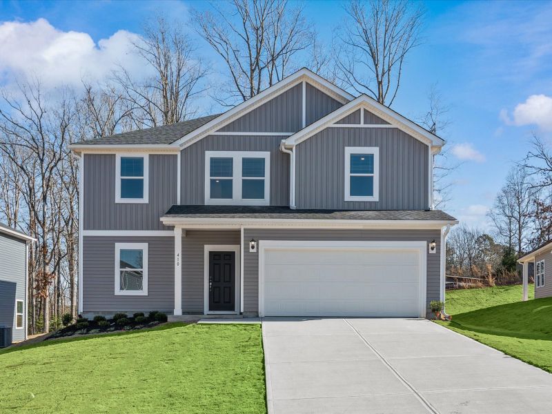 Front exterior of a new home in Maxwell Commons, Easley, SC, highlighting curb appeal (Image 1). Front exterior of a new home in Maxwell Commons, Easley, SC, highlighting curb appeal (Image 1).
