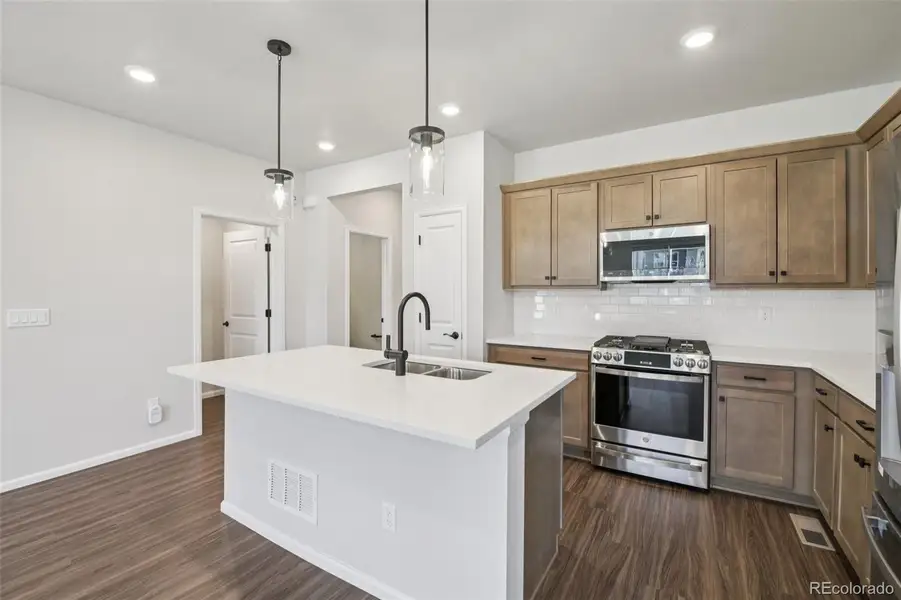 Furnished interior view inside a new home in The Villas Collection at Sterling Ranch, Littleton (Image 6).
