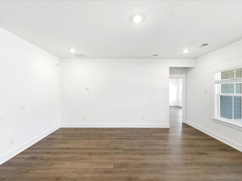 Spacious, unfurnished interior of a new home in The Coves at Lakes of Cane Bay II, Summerville (Image 39).