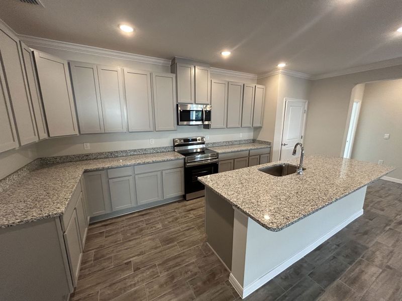 Furnished interior view inside a new home in Brookshire Green, Kingsland (Image 4).