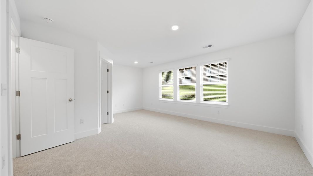 Furnished interior view inside a new home in Clayton Crossing, Arden (Image 24).