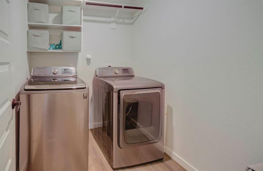 Laundry room with access directly to the primary room or hallway!