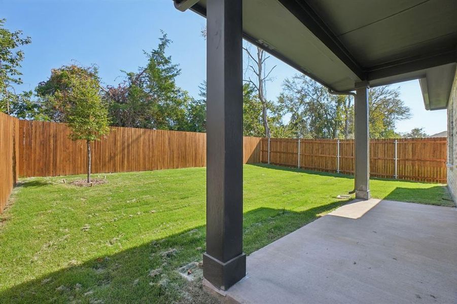 Exterior details and patio area of a home in Eastridge - Spring Series, McKinney (Image 4). Exterior details and patio area of a home in Eastridge - Spring Series, McKinney (Image 4).