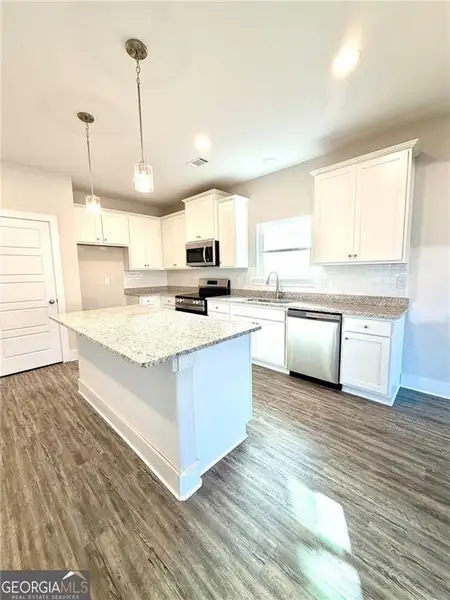 Furnished interior view inside a new home in , Hampton (Image 3).