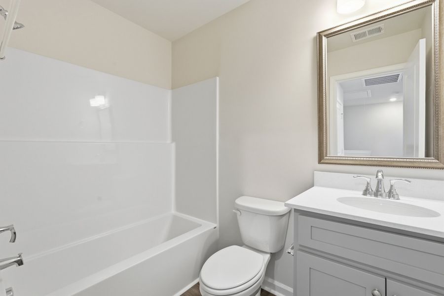 Representative furnished interior of a home built from the Aspen 3 Exterior by McGuinn Homes in Liberty Village, Hinesville (Image 17).