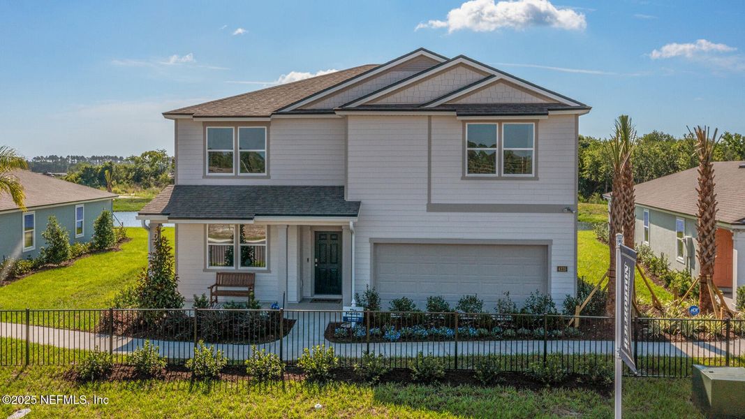 Front exterior of a new home in Rookery, Green Cove Springs, FL, highlighting curb appeal (Image 20).