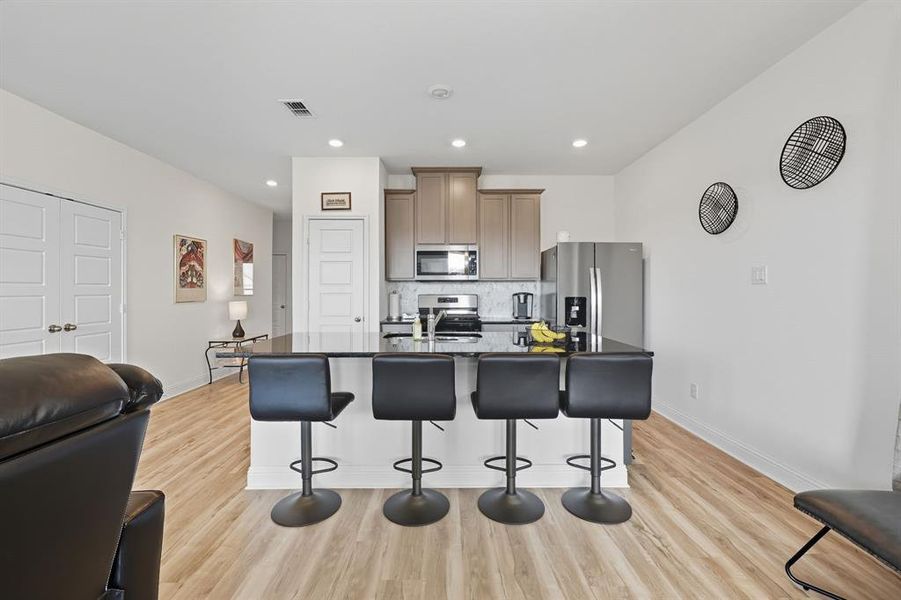 Kitchen featuring island breakfast bar Kitchen featuring island breakfast bar