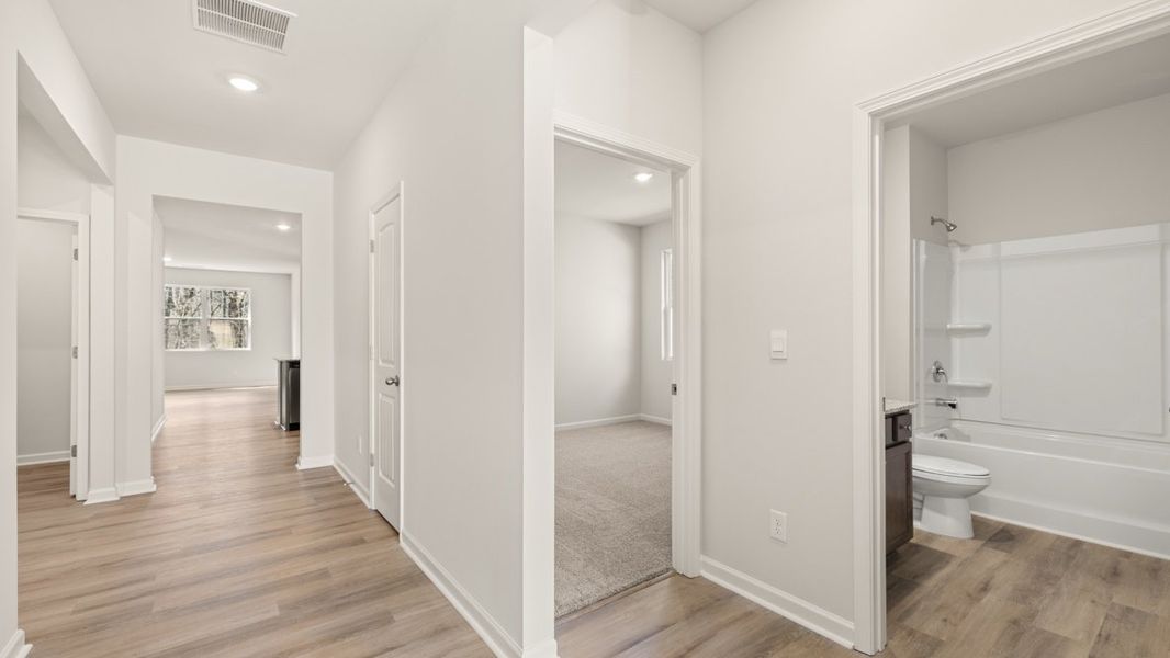 Representative unfurnished interior of a home built from the Cali by D.R. Horton in South Wind, South Fulton (Image 14).