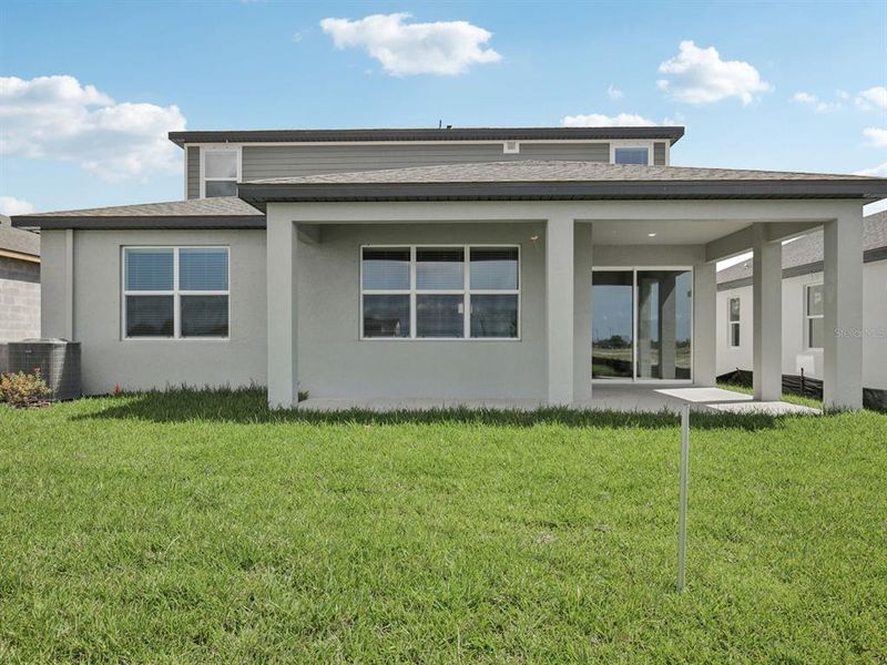 Exterior details and patio area of a home in Coasterra - Reserve Series, Palmetto (Image 27).