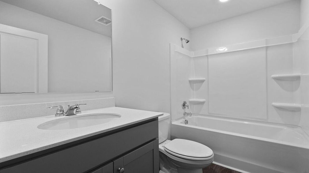 Furnished interior view inside a new home in Pineview North, Summerville (Image 9).