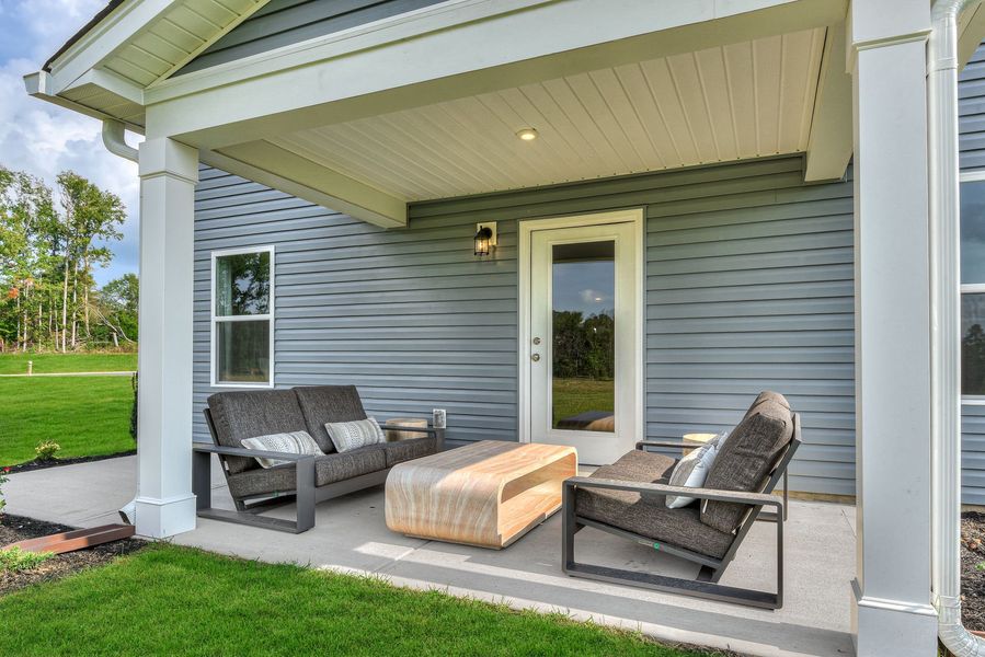 Exterior details and patio area of a home in Essence at Whiskey Run, New Ellenton (Image 2). Exterior details and patio area of a home in Essence at Whiskey Run, New Ellenton (Image 2).