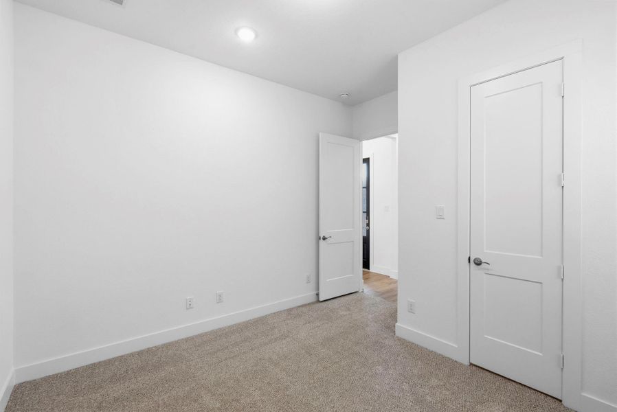 Spacious, unfurnished interior of a new home in Meridiana, Manvel (Image 13).