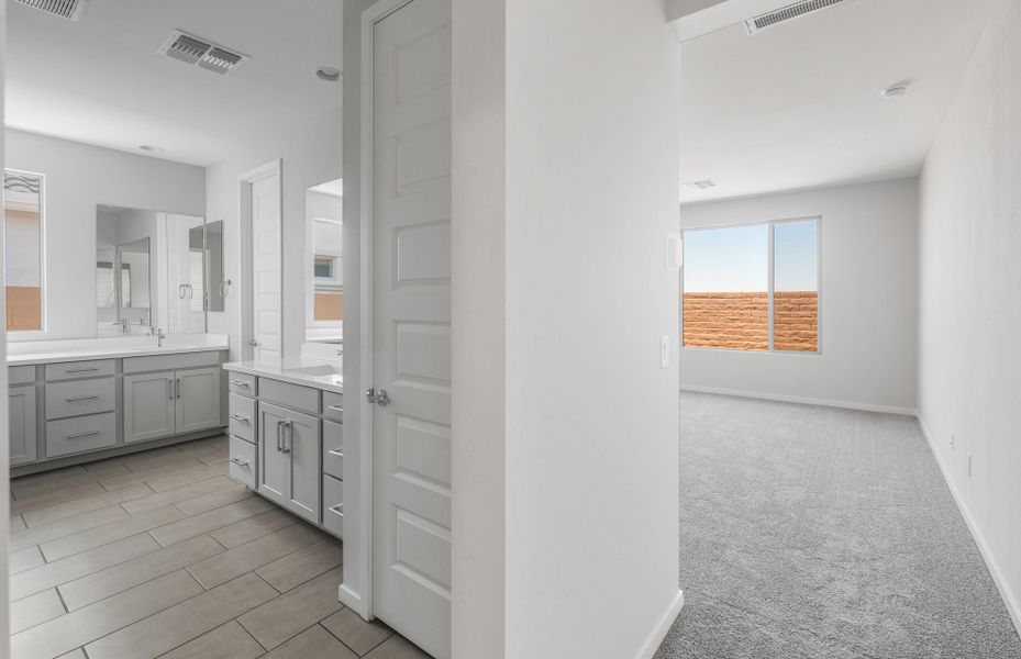 Spacious, unfurnished interior of a new home in Blossom Rock, Apache Junction (Image 21).