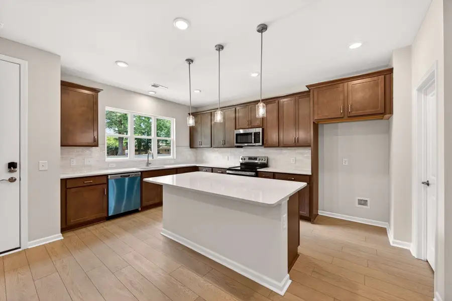 Furnished interior view inside a new home in Amplitude, Charlotte (Image 5).