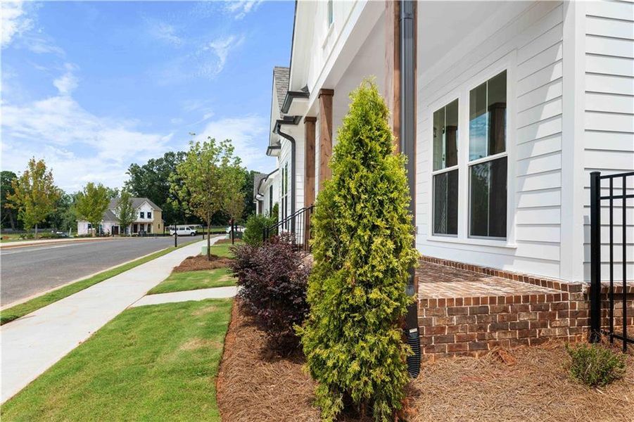 Exterior details and patio area of a home in Promenade at Sawnee Village, Cumming (Image 27). Exterior details and patio area of a home in Promenade at Sawnee Village, Cumming (Image 27).