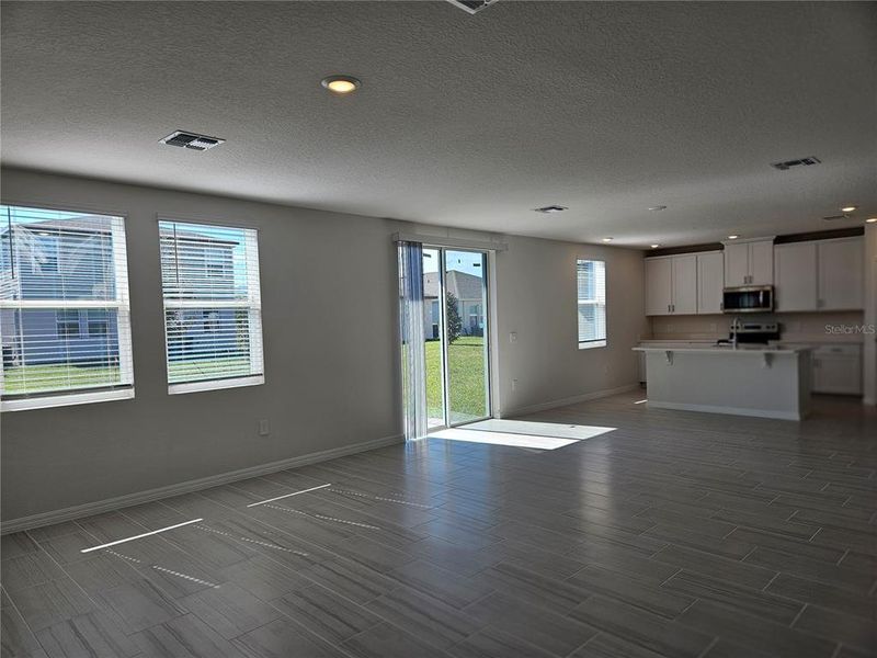 Spacious, unfurnished interior of a new home in Lawson Dunes - Signature Series, Haines City (Image 33).