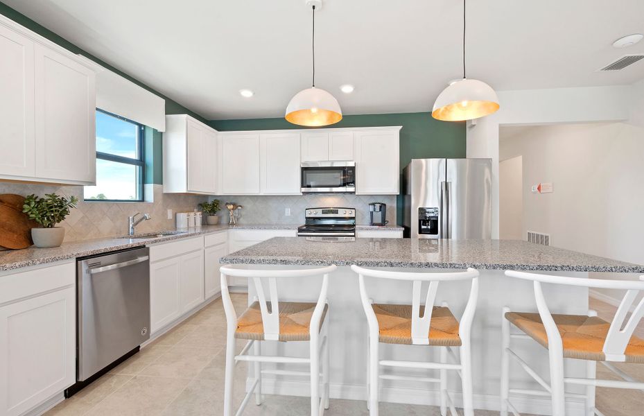 Furnished interior view inside a new home in Whispering Lakes, Lehigh Acres (Image 13).