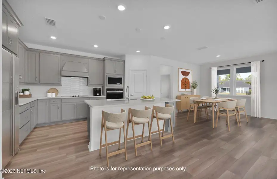 Furnished interior view inside a new home in Hyland Trail, Green Cove Springs (Image 5).