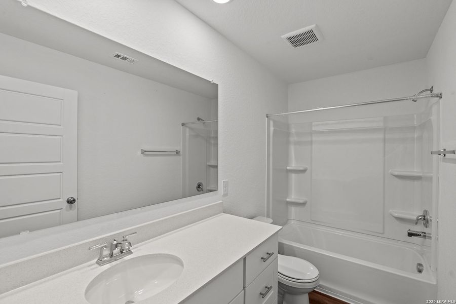 Furnished interior view inside a new home in Cinco Lakes, San Antonio (Image 9).