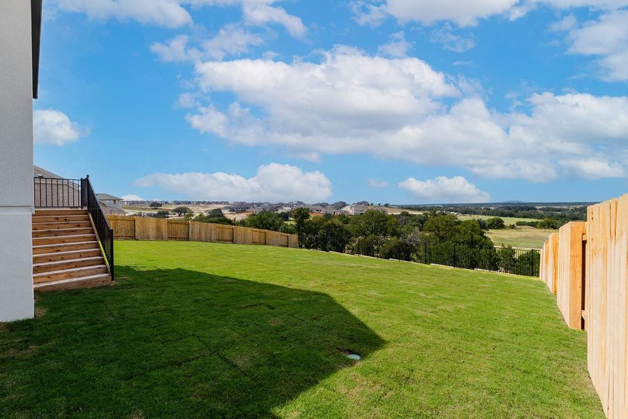 Exterior details and patio area of a home in Lariat - 80', Liberty Hill (Image 2). Exterior details and patio area of a home in Lariat - 80', Liberty Hill (Image 2).