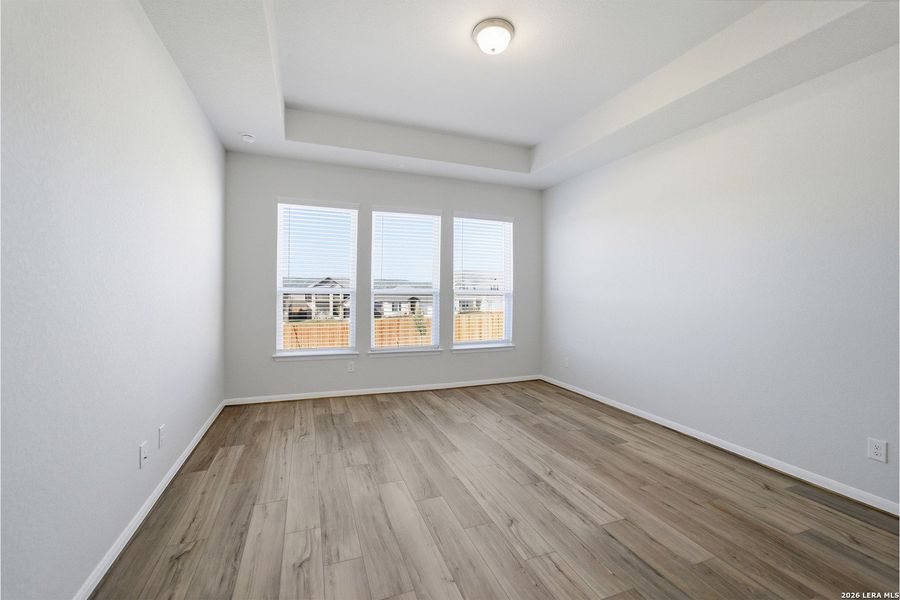 Spacious, unfurnished interior of a new home in The Woodlands at Medina Hills, Mico (Image 27).