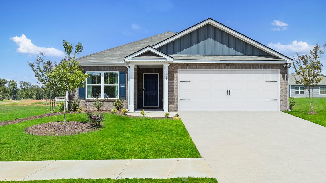 Front exterior of a new home in Cedar Gap, Fountain Inn, SC, highlighting curb appeal (Image 1). Front exterior of a new home in Cedar Gap, Fountain Inn, SC, highlighting curb appeal (Image 1).