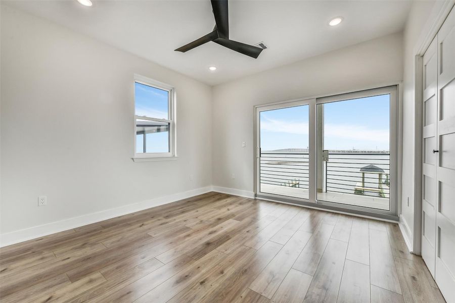 This secondary bath features an enclosed shower with clean, refined finishes. Designed for comfort and convenience, it feels fresh and polished. Guests will appreciate the comfort and privacy these bathrooms provide. Thoughtful details make all the difference.
